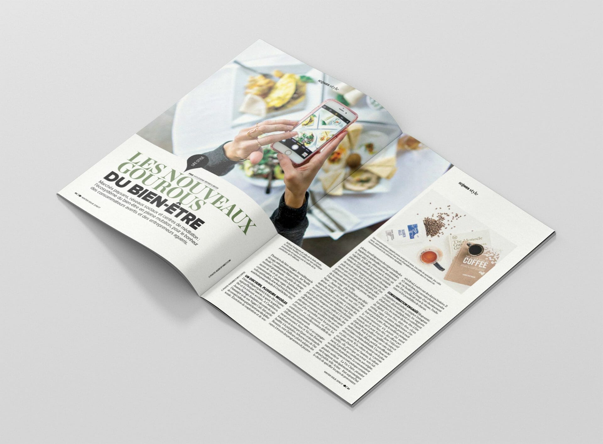 Un magazine avec une photo d'une personne tenant un téléphone.