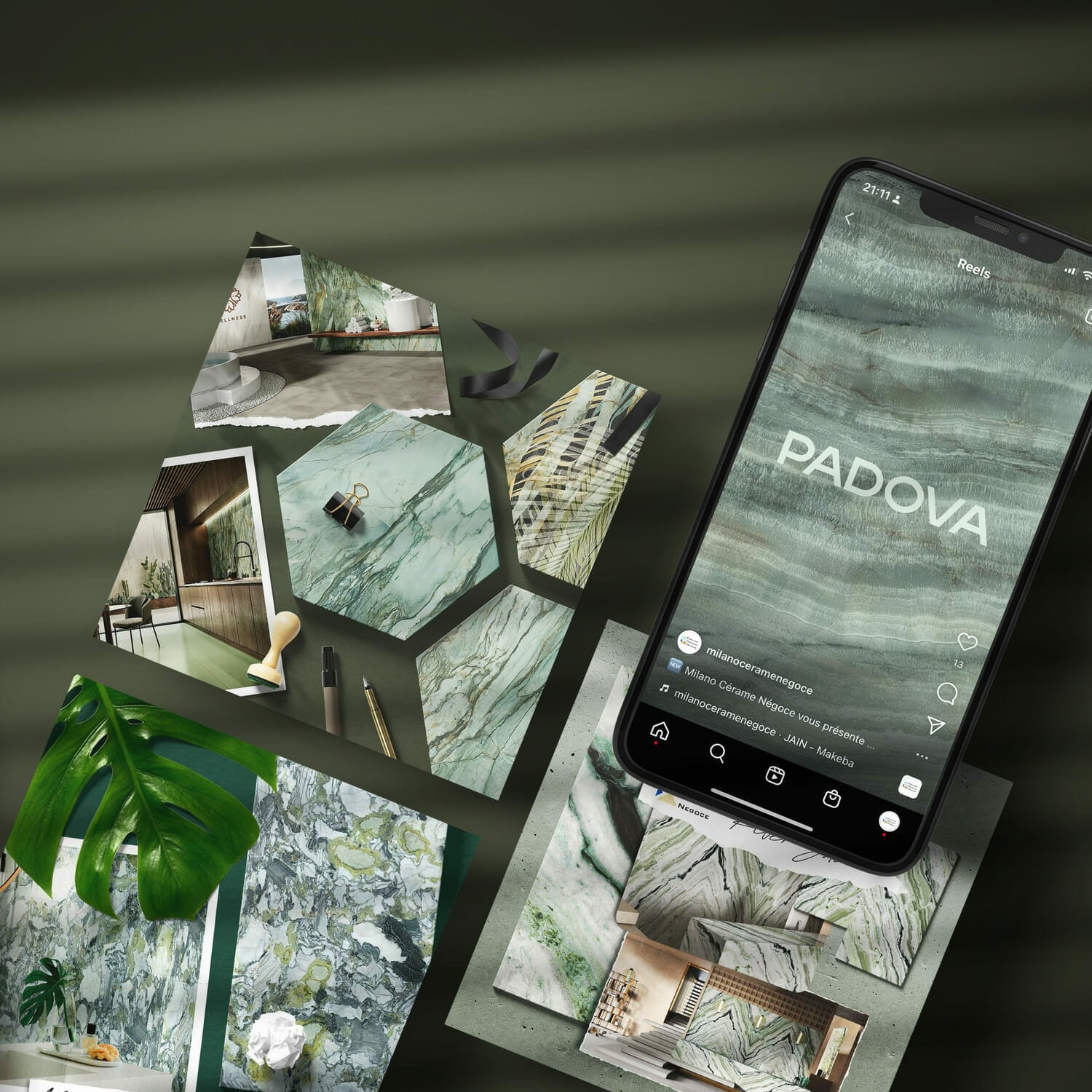 Un téléphone avec un écran vert et une plante dessus.